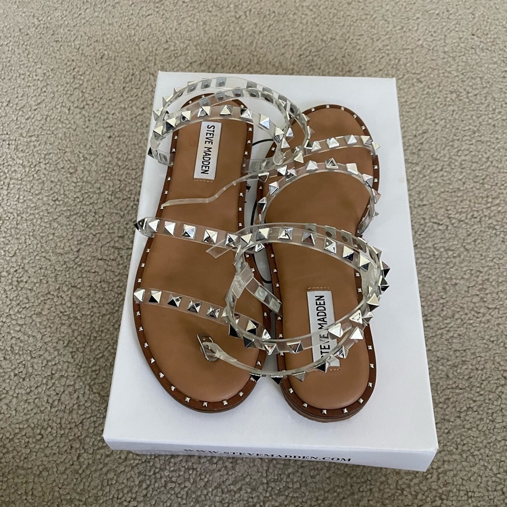 Steve Madden strapped open flat sandal. Clear. Size 6.5. Worn only a few times